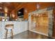Basement bar with adjacent spa featuring a glass-enclosed shower at 2440 Emerald Dr, Jonesboro, GA 30236