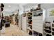 Spacious walk-in closet with ample shelving and drawer space at 2440 Emerald Dr, Jonesboro, GA 30236