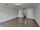 Bright bedroom with laminate wood floors and two closets at 3263 Star Pine Ct, Duluth, GA 30096