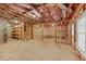 Unfinished basement with framing and potential for expansion at 727 Pear Grove Pl, Marietta, GA 30066