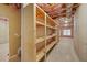 Unfinished basement with built-in shelving unit at 727 Pear Grove Pl, Marietta, GA 30066