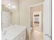 Simple bathroom with vanity and access to another room at 727 Pear Grove Pl, Marietta, GA 30066