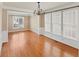Spacious dining room with hardwood floors and chandelier at 727 Pear Grove Pl, Marietta, GA 30066