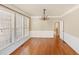 Bright dining room with hardwood floors and large windows at 727 Pear Grove Pl, Marietta, GA 30066