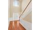 Bright two story foyer with hardwood floors and a staircase at 727 Pear Grove Pl, Marietta, GA 30066