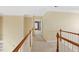 Upstairs hallway with carpeted flooring at 727 Pear Grove Pl, Marietta, GA 30066