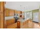 Modern kitchen with granite countertops and wood cabinets at 727 Pear Grove Pl, Marietta, GA 30066