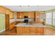 Island kitchen with granite countertops and ample cabinet space at 727 Pear Grove Pl, Marietta, GA 30066