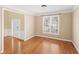 Spacious office with hardwood floors and large windows at 727 Pear Grove Pl, Marietta, GA 30066