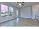 Bright living room with hardwood floors and large windows with a view at 3400 Ripple Loop # 129, South Fulton, GA 30349