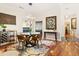 Elegant dining room with hardwood floors and statement artwork at 451 Shyrewood Dr, Lawrenceville, GA 30043