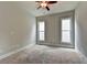 Simple bedroom with new carpet and neutral walls at 11355 Bennett Ln, Johns Creek, GA 30097