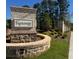 Knollwood community entrance with brick pillars and landscaping at 11355 Bennett Ln, Johns Creek, GA 30097