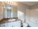 Bathroom with a tub, sink, and vanity at 6390 Alford Cir, Lithonia, GA 30058