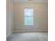 Simple bedroom with a window and neutral decor at 6390 Alford Cir, Lithonia, GA 30058