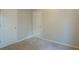 Spacious bedroom with neutral walls and carpet at 6390 Alford Cir, Lithonia, GA 30058