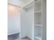 Walk-in closet with shelves and hanging rod at 6390 Alford Cir, Lithonia, GA 30058