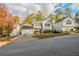Two-story house with attached garage and landscaping at 6390 Alford Cir, Lithonia, GA 30058