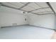 Spacious garage with overhead door open at 6390 Alford Cir, Lithonia, GA 30058