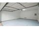 Attached garage with light-grey floor at 6390 Alford Cir, Lithonia, GA 30058