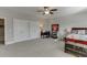 Bright bedroom with double closets and a workspace at 5685 Ansley Ridge Ln, Suwanee, GA 30024