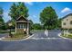 Community entrance with guardhouse and security gate at 1397 Liberty Parkway Nw, Atlanta, GA 30318