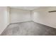 Finished basement area with neutral carpeting at 5235 Shadow Path Sw Ln, Lilburn, GA 30047