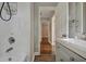 Updated bathroom with subway tile and gray vanity at 1642 Cecilia Se Dr, Atlanta, GA 30316
