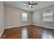 Bedroom with hardwood floors and two windows at 1642 Cecilia Se Dr, Atlanta, GA 30316