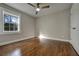 Spacious bedroom with hardwood floors and ceiling fan at 1642 Cecilia Se Dr, Atlanta, GA 30316