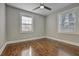 Well lit bedroom with hardwood floors and ceiling fan at 1642 Cecilia Se Dr, Atlanta, GA 30316