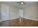 Hardwood floor bedroom with access to another room at 1642 Cecilia Se Dr, Atlanta, GA 30316