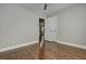 Hardwood floor bedroom with access to another room at 1642 Cecilia Se Dr, Atlanta, GA 30316