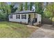 Ranch style home with a driveway and a fenced backyard at 1642 Cecilia Se Dr, Atlanta, GA 30316