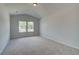 Spacious bedroom with vaulted ceilings and neutral carpet at 203 Arabella Pkwy, Locust Grove, GA 30248