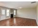 Spacious living room featuring a fireplace and hardwood floors at 2438 Brighton Trl, Jonesboro, GA 30236