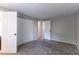 Spacious bedroom with ample closet space and neutral carpeting at 2076 Scarbrough Dr, Stone Mountain, GA 30088