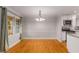 Bright dining room with hardwood floors and chandelier at 4800 Kenilworth Dr, Stone Mountain, GA 30083