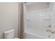 Clean bathroom with shower/tub combo and striped shower curtain at 236 Ruthe Cvs, Locust Grove, GA 30248