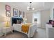 Cozy bedroom with colorful decor and a window overlooking the backyard at 236 Ruthe Cvs, Locust Grove, GA 30248