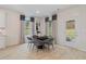 Bright breakfast nook with window seating and access to a patio at 236 Ruthe Cvs, Locust Grove, GA 30248