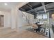 Modern dining room with black and white geometric rug and statement lighting at 236 Ruthe Cvs, Locust Grove, GA 30248