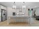 Modern kitchen with large island and stainless steel appliances at 236 Ruthe Cvs, Locust Grove, GA 30248