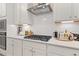Gas cooktop with white cabinetry and quartz countertops at 236 Ruthe Cvs, Locust Grove, GA 30248