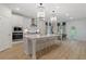 Modern kitchen with large island and stainless steel appliances at 236 Ruthe Cvs, Locust Grove, GA 30248