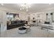 Open concept living room with kitchen and dining views at 236 Ruthe Cvs, Locust Grove, GA 30248