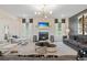 Open concept living room with fireplace and kitchen views at 236 Ruthe Cvs, Locust Grove, GA 30248