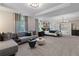 Luxurious main bedroom with sitting area and ensuite bathroom at 236 Ruthe Cvs, Locust Grove, GA 30248