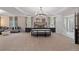 Large main bedroom with sitting area and neutral color palette at 236 Ruthe Cvs, Locust Grove, GA 30248