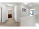 Upstairs hallway with carpet, access to bathroom and bedrooms at 1967 Old Dogwood, Jonesboro, GA 30238